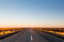 Explore the best range of highway terrain tyres with the Dueler pattern. Image of open road.